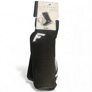 Soccer Shin Guards! New with tags! Size Medium! Up to 5’3”! Black and white!